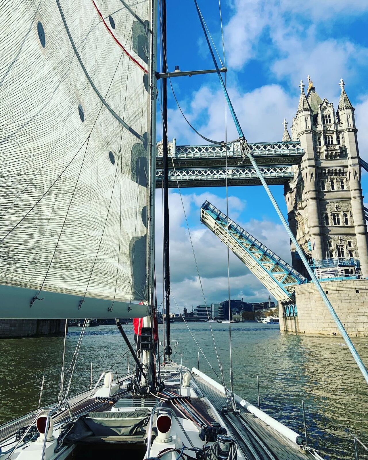 Looking up at Tower Bridge from the deck while sailing the Thames